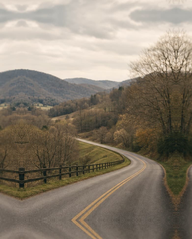 Rural two-lane road curving through a Southwest Virginia valley